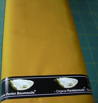 Die originale Perlen Baumwolle - ockergelb 150 cm breit